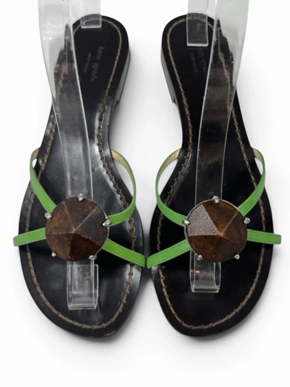 Kate Spade Green Leather Flat Sandals with wooden center ornament.